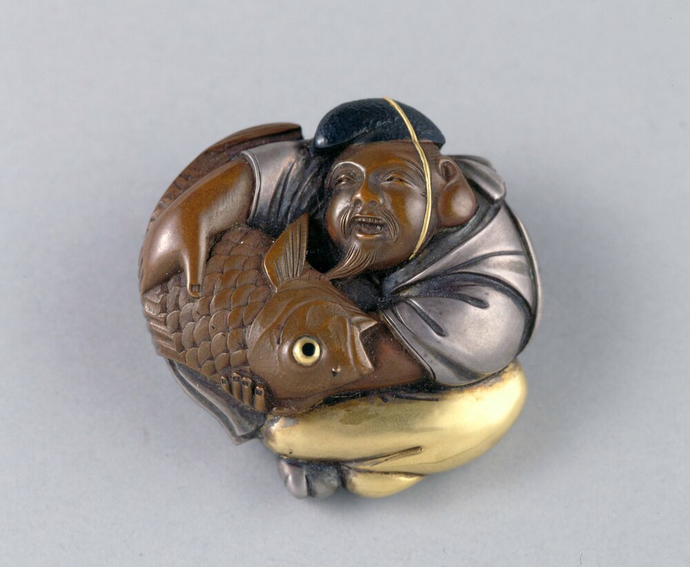 Carved Netsuke Toggle in Form of the Deity Ebisu | EDO-TOKYO MUSEIUM  Digital Archives